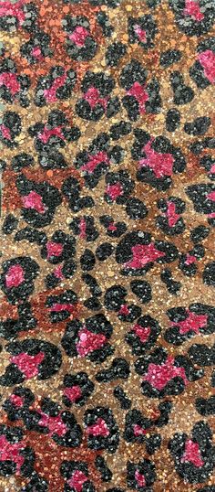 an animal print rug with pink and black spots