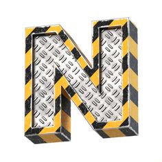 the letter n is made up of metal and yellow striped material with black stripes on it