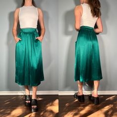 Stunning emerald green midi skirt with pockets! Size Small  Brand - Pierre Bouchard Era - 80s  Excellent Vintage Condition Made in Canada Measurements LAYING FLAT Waist - 12.25" - 14" Hips - 23" Length - 30.5" Please let me know if you have any questions! Formal Maxi Skirt, Green Midi Skirt, Midi Skirt With Pockets, Green Emerald, Green Skirt, Emerald Green, Dark Green, Maxi Skirt, Womens Bottoms