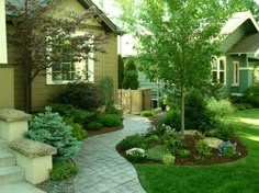 a house with landscaping in the front yard