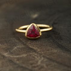 Vintage Red Ruby Ring, 14k Solid Gold Trilliant Cut Ring, Ruby Engagement Ring, Solitaire Ring, July Birthstone Jewelry, Ruby Handmade Ring  Main Stone: Ruby ( Lab-Created ) Main Stone Color: Red  Main Stone Shape: Trilliant  S I L V E R J E W E L R Y C A R E Silver is not the best friend of oxygen and sulfur; it can be oxidized and tarnished from time to time it is the nature of silver. To keep the silver shiny and prevent it from oxidizing fast, we would recommend the following instructions; * Red Ruby Ring, Rubin Ring, Jewelry Ruby, Engagement Ring Solitaire, Ring Ruby, Fancy Gifts, July Birthstone Jewelry, Ruby Engagement Ring, July Birthstone