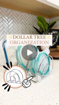 the dollar tree organization video is displayed in front of a kitchen counter with dishes and utensils