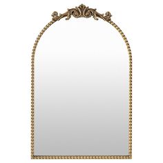 an ornate gold framed mirror on a white background