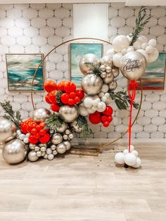 an arrangement of balloons and decorations in a room