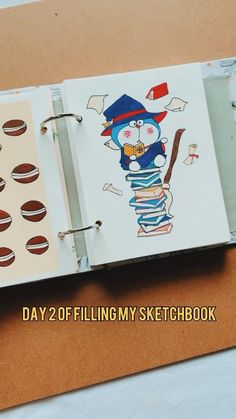 a notebook with an image of a cartoon character on it