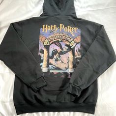 Urban Outfitters Harry Potter And The Sorcerer’s Stone Hoodie Sweatshirt Nwot Size Medium Harry Potter Hoodie With Graphics Printed At The Left Chest & Back. Pullover Silhouette Features An Adjustable Drawstring Hood, Front Kanga Pocket And A Rib-Knit Trim. Measurements Taken From Size Medium - Chest: 22" - Length: 28" Any Questions? Just Ask! Additional Discounts On Bundles! Harry Potter Hoodie, Urban Outfitters Shirts, The Sorcerer's Stone, Urban Outfitters Women, Hoodie Sweatshirt, Hoodies Womens, Rib Knit, Urban Outfitters, Harry Potter