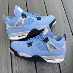 Elevate your sneaker game with these Nike Air Jordan IV 4 Retro Unc University Blue CT8527-400 sneakers. These sneakers are perfect for any athletic occasion with its stylish design and comfortable fit. The shoe features a medium width, leather upper material, and a trendy university blue shade. The sneaker is a men's size 11 and features a style code of CT8527-400. It was released in 2021 and is a Nike Air Jordan 4 Retro model. This sneaker is perfect for any sneakerhead looking to add a unique and stylish pair to their collection. Royal Blue Shoes Sneakers, Blue Jordans 4s, University 4s, Jordan 4s Blue, Jordan 4 Bleu, Jordan 4s Outfit, Air Jordan 4 Outfit, Jordan 4 University Blue, Jordan 4 Outfit