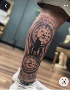 a man's leg with a clock tattoo on it and the words, my love is