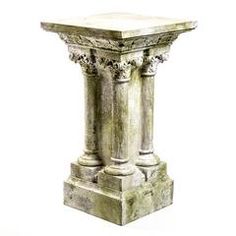 an old stone pedestal is shown against a white background