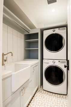 a washer and dryer in a small room