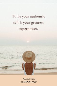 a woman sitting on top of a beach next to the ocean with a quote above her