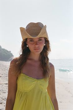 Forever a classic, this essential cowboy hat is made of woven raffia in a silhouette perfect from beach to concert and everywhere in between. Summer Panama Hat With Short Brim For Ranch, Country Style Straw Hat For Kentucky Derby, Country Style Straw Hat For Kentucky Derby Vacation, Summer Sun Hat For Kentucky Derby And Rodeo, Western Boater Hat In Toquilla Straw For Vacation, Straw Sun Hat For Kentucky Derby And Rodeo, Kentucky Derby Straw Sun Hat For Rodeo, Western Style Natural Boater Hat For Beach, Country Style Straw Boater Hat For Summer