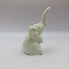 PRICES MAY VARY. Size: 4 x 1.5 x 1.5 inches High Quality Ceramics: White elephant figurine decor is made from non-toxic, strong and high quality glazed ceramic, not easy to break, can be used for a long time. It is a good wall shelf decor Home Decor Accent: This white elephant desk decor could be used as beautiful home decorations,fits easily into any decor including bedroom,bathroom, living room or kitchen White Elephant Elephant Statue Decor, Handmade Bookshelves, White Elephant Gifts Exchange, Small Elephant, Ceramic Elephant, Wall Shelf Decor, Elephant Statue, Elephant Decor, Elephant Figurines