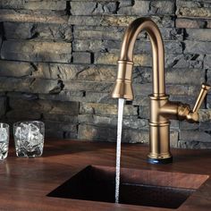 Inspired by the spirit of the industrial revolution, the Artesso Kitchen Collection by Brizo is a blend of beauty, sophistication, and artisan craftsmanship. It is a wide collection of alluring, exceptional kitchen faucets optimized for beneficial use. An example of which is the 64025LF-GL pulldown faucet. This single-handle faucet is made from high-quality materials that assure you durability and functionality. Its spout can be rotated up to 360-degrees which is very user-friendly and makes cleaning a lot easier. The wand has 2 functions that you can choose from either aerated stream or spray options.To turn the water on and off, simply touch the faucet anywhere on the body or on the handle. This is an efficient way to conserve water and save money thanks to its SmartTouch technology. Thi Ways To Conserve Water, Entertaining Tips, Bar Prep, Kitchen Fixture, Landscaping Tools, Commercial Bathroom Sinks, Corner Tub, Rustic Bar, Kitchen Company