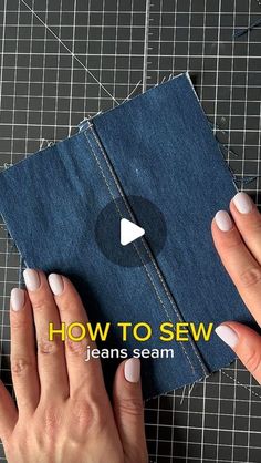 two hands are holding a piece of fabric with the words how to sew on it