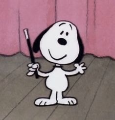 a cartoon character holding a baseball bat in his hand and standing on the floor next to a pink wall