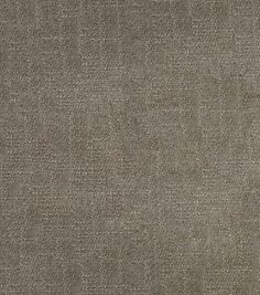 an upholstered gray fabric textured with small squares