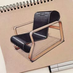 a drawing of a chair sitting on top of a notebook