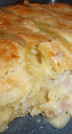 a close up view of some food on a pan with it's crust removed