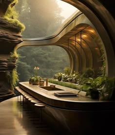 an outdoor dining area in the middle of a forest with lots of greenery on it