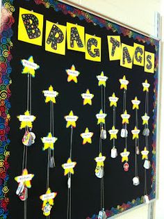 a bulletin board with star decorations on it