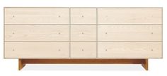 a wooden dresser with six drawers and two doors on each side, in front of a white background