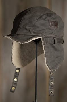 Our Weathered Cotton Winter Cap is crafted with a rugged look, offers an insulating Sherpa lining and earflaps for versatility. Free shipping + returns. Grunge Hats, Dieselpunk Fashion, Aviator Cap, Winter Caps, Aviator Hat, Trapper Hat, Rugged Look, Trapper Hats, Hat Ideas