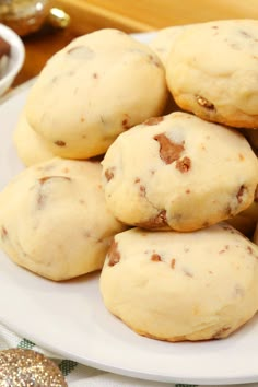 a white plate topped with cookies on top of a table