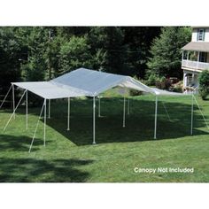 two pictures of a truck and tent in the grass