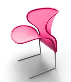 a pink chair sitting on top of a white floor next to a metal frame structure