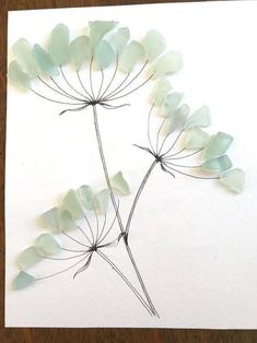 a piece of paper that has some flowers on it