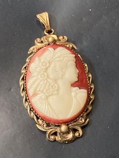 Vintage 50s 60s I think pressed glass rather than carved  shell CAMEO lots of detail and nice quality pendant gold plated Retro Gold Cameo Jewelry, Gold Cameo Vintage Earrings, Antique Gold Cameo Pendant Necklace, Antique Yellow Gold Cameo Jewelry, Vintage Yellow Gold Cameo Necklace, 50s Jewelry, Snake Necklace Silver, Body Jewelry Piercing, Snake Necklace