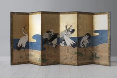 four panel screen with cranes on the beach