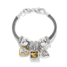 Make her day golden with this Beverly Glam charm bracelet filled with glints of gold. Charms etched with loving messages are showcased along with a stopper, bead and spacer on this gift-she'll-love. Classic Gold-tone Charm Bracelet As Gift, Classic Gold-tone Charm Bracelet Gift, Trendy Gold-tone Metal Charm Bracelet, Loving Messages, Gold-tone Metal Bangle Charm Bracelet, Brighton Charm Bracelet, Brighton Jewelry, Gold Charms, Metal Heart