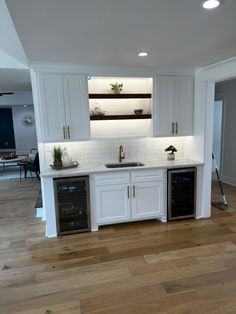 the kitchen is clean and ready for us to use it's new appliances in