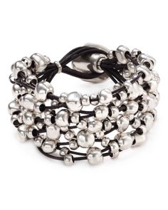 Unconventionally radiant, Uno de 50's masterful bracelet has a bubbly, weekend-right charm. Metal Bracelet With Polished Beads, Polished Metal Bead Bracelet, Silver Jewelry With Round Beads For Fashion, Adjustable Polished Beads Sterling Silver Bracelet, Modern Polished Beads Bracelet, Modern Jewelry Bracelet As Fashion Accessory, Silver Bracelets With Round Beads As Fashion Accessory, Elegant Silver Bracelets With Large Beads, Elegant Silver Bracelet With Large Beads