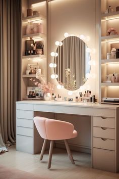 a vanity with lights and a mirror on the wall, along with a pink chair in front of it