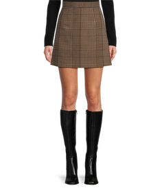 From Antonio Melani&#x2C; this skirt features: Woven Houndstooth Fabrication A-Line SilhouettePlaid PrintHigh Rise Waistline 2 Back Faux Welt PocketsFully LinedStraight HemlineMini Skirt Length Back Invisible Zipper with Hook & Eye closureApprox. 15.75" in Length Polyester&#x2C; Rayon&#x2C; ElastaneProfessional Dry Cleaning Only Imported. Career Woman, Antonio Melani, Casual Skirts, Hook Eye, Dillard's, Winter Looks, Invisible Zipper, Skirt Length, Modern Woman