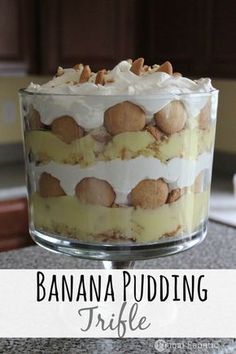 banana pudding trifle in a glass dish on a granite countertop with the words, banana pudding trifle