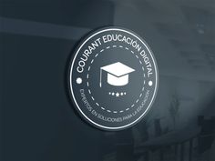 a black and white logo with the words courant educacion hospital on it