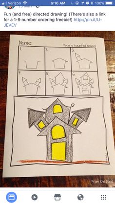 a child's drawing of a house made out of construction paper with numbers and shapes