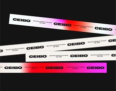 three white and red labels with the word geibo on them in black background