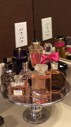 Use a silver cake platter as a perfume display. I got this one at The Sample Hou... - #Cake #Display #Hou #Perfume #platter #Sample #Silver Perfumes Caravan, Bandeja Perfume, Perfume Collection Display, Koleksi Parfum, Penyimpanan Makeup, Perfume Storage, Bath & Body Works, Perfume Display, Silver Cake