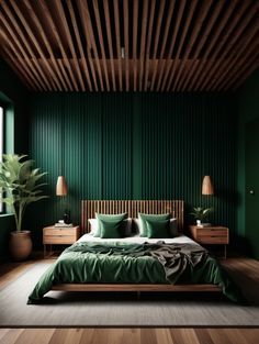 a bedroom with green walls and wood flooring is pictured in this image, the bed has