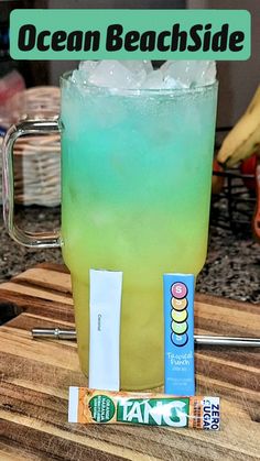 an ocean beach side drink on a cutting board