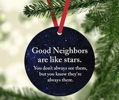 a blue ornament hanging from a christmas tree with the words good friends are like stars