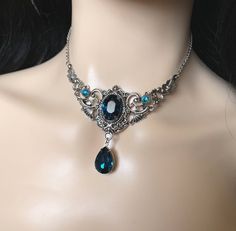 This elegantly ornate necklace is made with antique silver tone centerpieces, featuring lavish baroque details. Its mesmerizing design is accented with dazzling dark teal glass crystals/jewels. Decorated portion is 4" wide and 2 1/2" tall in the very center.  Necklace length is adjustable 14"-17" with soldered stainless steel cable chain, lobster clasp and extender.If you would like a different length, please send us a message.Earrings: These dainty and elegantly ornate earrings are made with an Baroque Details, Ornate Earrings, Gothic Antique, Ornate Necklace, Teal Jewelry, Dark Aqua, Teal Glass, Beaded Bib Necklace, Dnd Items