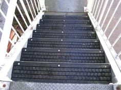 there is a set of stairs with treads on it