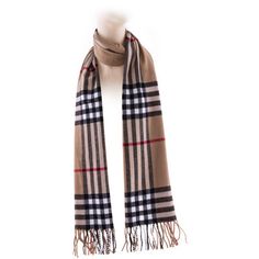 Shield your neck from the cold with this long acrylic scarf. Printed with a black New England plaid and decorated with fringe, this scarf gives any jacket a classic finishing touch. Color: Camel | Deluxe Comfort Acrylic Throw 12.0 W in brown in Camel | 12" W X 72" L | Wayfair Classic Brown Winter Scarves, Classic Brown Winter Scarf, Comfort Color, Plaid Scarf, New Black, Camel, New England, Black And Brown, Cashmere