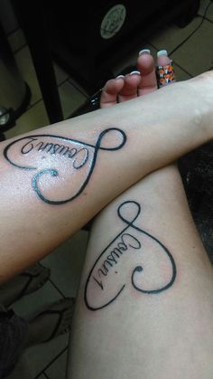 two people with tattoos on their legs that say happy birthday and have the same name